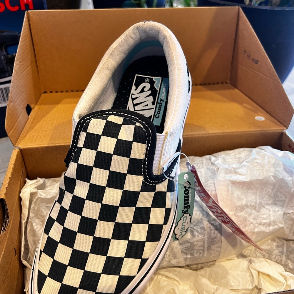 Vans Black and White Checkerboard Slip-Ons